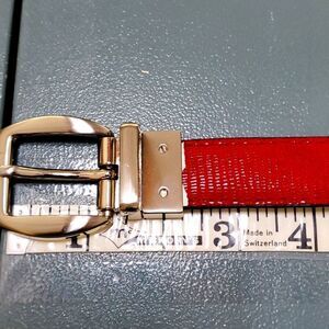 Great red/black reversible belt. Silver‎ hardware. Good used condition. Fun